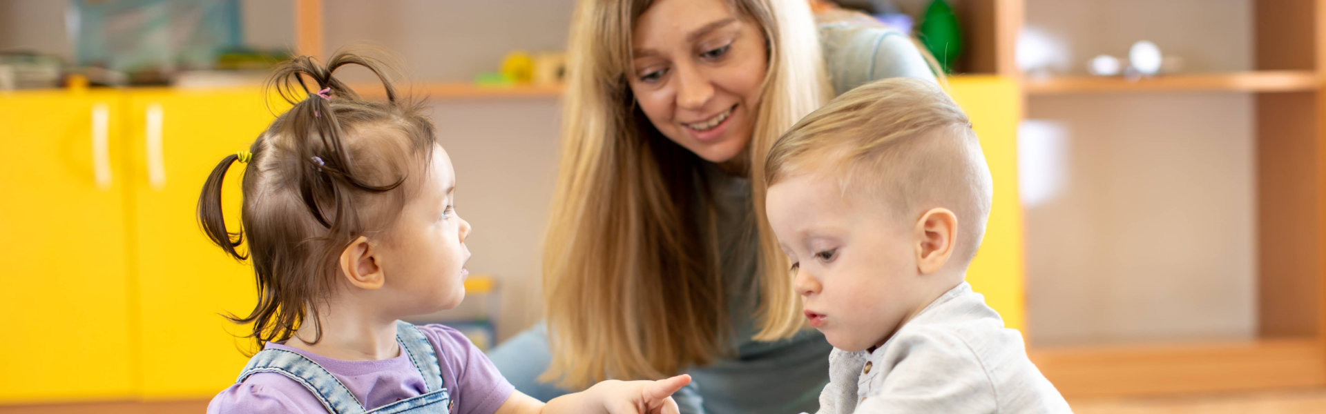 teacher with toddler students